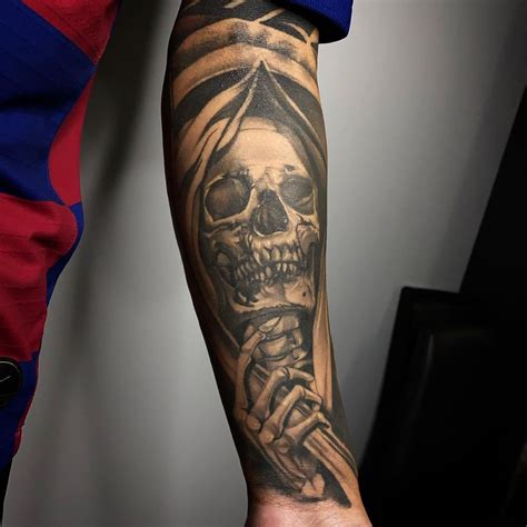 Black Ink Grim Reaper With Coffin And Flowers Tattoo On Forearm. Black Ink Grim Reaper With Crows Tattoo On Right Full Sleeve. Black Ink Grim Reaper With …